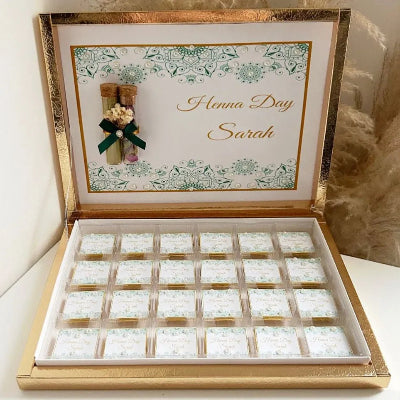 Box Chocolat Henna Day - Coffret doré avec chocolats personnalisés, tubes décoratifs et détails élégants, parfait pour célébrations Henna Day